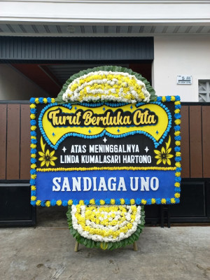 Papan Bunga Duka di Wadangku